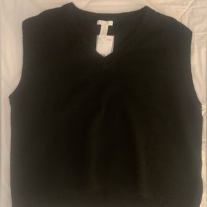 Black sweater vest
